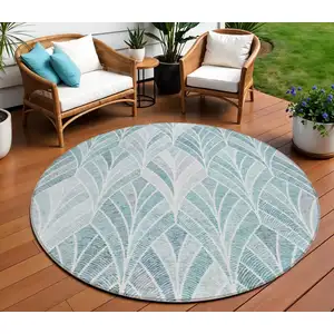 Photo of 8' Aqua Mint Green And Silver Round Geometric Washable Indoor Outdoor Area Rug