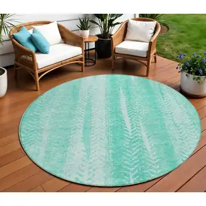 Photo of 8' Aqua Teal Blue And Ivory Round Botanical Leaves Washable Indoor Outdoor Area Rug