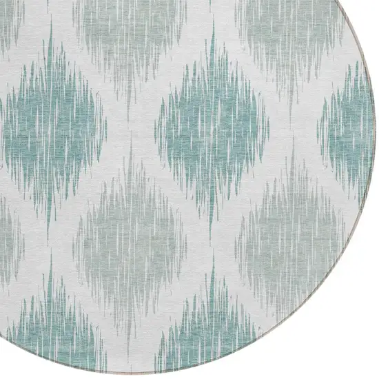 8' Aqua Teal Blue And Ivory Round Ikat Washable Indoor Outdoor Area Rug Photo 4