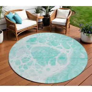 Photo of 8' Aqua Teal Blue And Ivory Round Nautical Washable Indoor Outdoor Area Rug