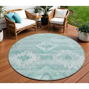 Photo of 8' Aqua Turquoise And Ivory Round Southwestern Washable Indoor Outdoor Area Rug