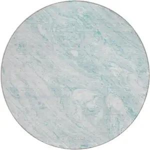 Photo of 8' Aquamarine Aqua And Ivory Round Abstract Washable Indoor Outdoor Area Rug