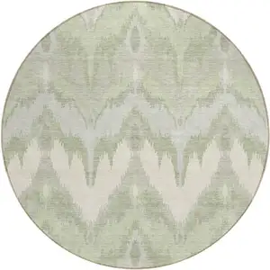 Photo of 8' Artichoke Green And Beige Round Ikat Washable Indoor Outdoor Area Rug