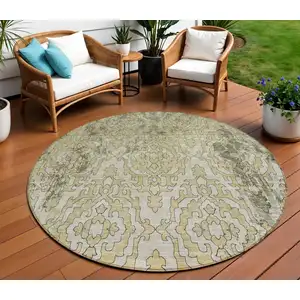 Photo of 8' Artichoke Green And Beige Round Medallion Washable Indoor Outdoor Area Rug