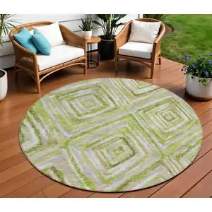 Photo of 8' Artichoke Green And Brown Round Geometric Washable Indoor Outdoor Area Rug