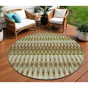 Photo of 8' Artichoke Green And Brown Round Southwestern Washable Indoor Outdoor Area Rug