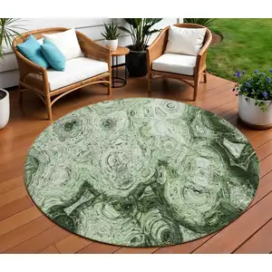 Photo of 8' Artichoke Green And Emerald Round Abstract Washable Indoor Outdoor Area Rug