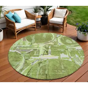 Photo of 8' Artichoke Green And Fern Green Round Geometric Washable Indoor Outdoor Area Rug