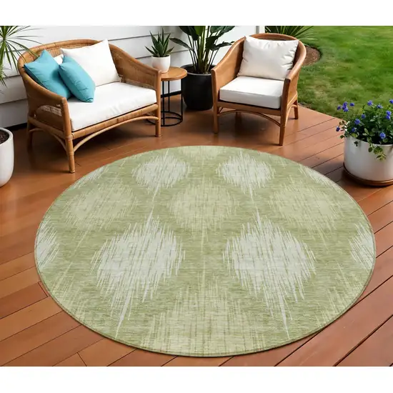 8' Artichoke Green And Fern Green Round Ikat Washable Indoor Outdoor Area Rug Photo 1