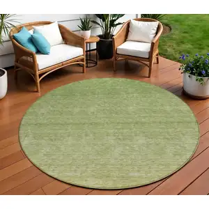 Photo of 8' Artichoke Green And Fern Green Round Ombre Washable Indoor Outdoor Area Rug