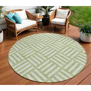 Photo of 8' Artichoke Green And Ivory Round Geometric Washable Indoor Outdoor Area Rug