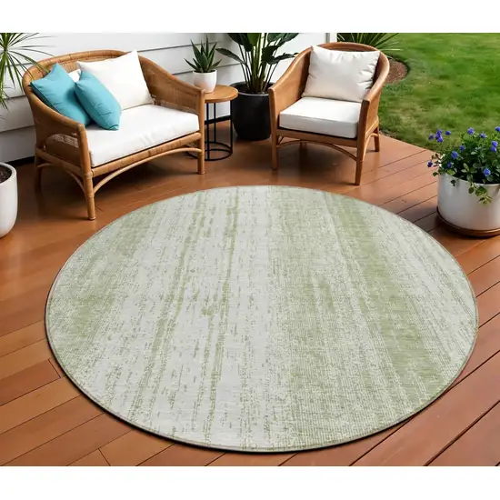 8' Artichoke Green And Ivory Round Striped Washable Indoor Outdoor Area Rug Photo 1