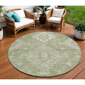 Photo of 8' Artichoke Green Beige And Ivory Round Medallion Washable Indoor Outdoor Area Rug