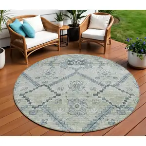 Photo of 8' Artichoke Green Denim Blue And Silver Round Floral Washable Indoor Outdoor Area Rug