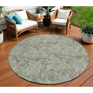 Photo of 8' Artichoke Green Gray And Taupe Round Floral Washable Indoor Outdoor Area Rug