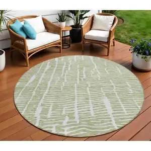 Photo of 8' Artichoke Green Green And Ivory Round Abstract Washable Indoor Outdoor Area Rug