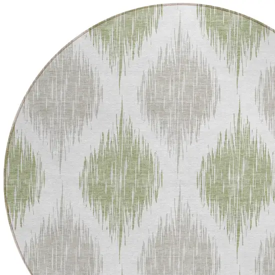 8' Artichoke Green Ivory And Gray Round Ikat Washable Indoor Outdoor Area Rug Photo 4