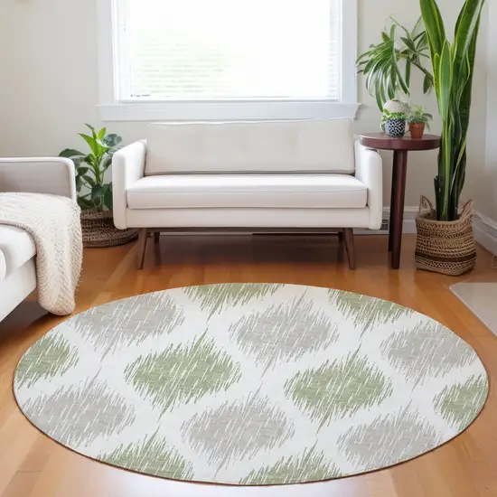 8' Artichoke Green Ivory And Gray Round Ikat Washable Indoor Outdoor Area Rug Photo 8