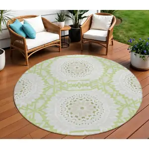 Photo of 8' Artichoke Green Olive Green And Tan Round Floral Medallion Washable Indoor Outdoor Area Rug