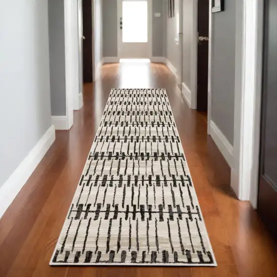 8' Beige And Black Geometric Runner Rug Photo 1