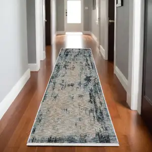 Photo of 8' Beige And Blue Abstract Runner Rug With Fringe