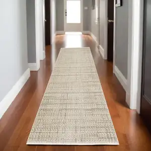 Photo of 8' Beige And Brown Geometric Runner Rug With Fringe