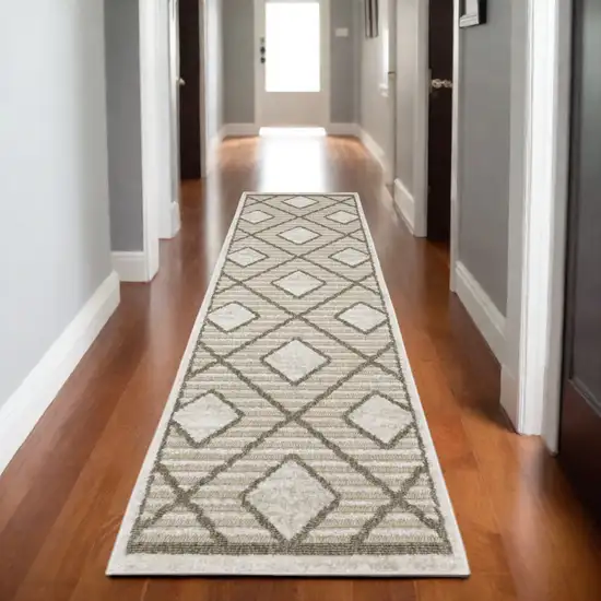 8' Beige And Brown Geometric Runner Rug Photo 1