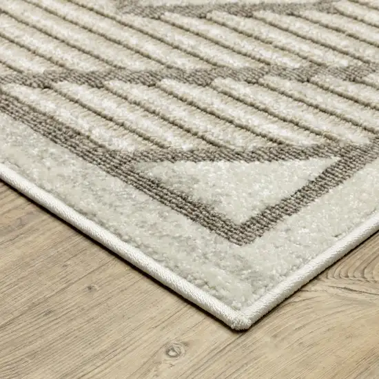 8' Beige And Brown Geometric Runner Rug Photo 5