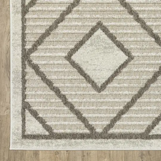 8' Beige And Brown Geometric Runner Rug Photo 7