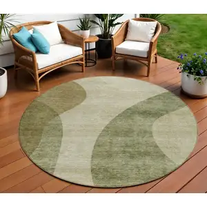 Photo of 8' Beige And Chocolate Round Abstract Washable Indoor Outdoor Area Rug