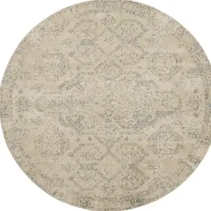 Photo of 8' Beige And Gray Geometric Distressed Round Rug