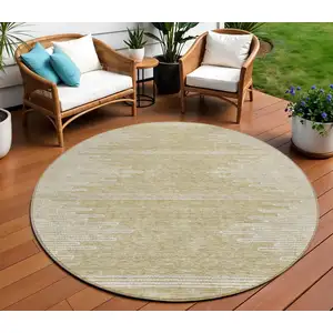 Photo of 8' Beige And Ivory Round Abstract Washable Indoor Outdoor Area Rug