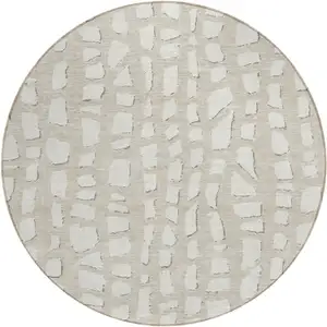 Photo of 8' Beige And Ivory Round Abstract Washable Indoor Outdoor Area Rug