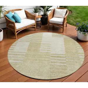 Photo of 8' Beige And Ivory Round Striped Washable Indoor Outdoor Area Rug