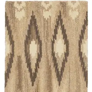 Photo of 8' Beige And Ivory Wool Abstract Hand Tufted Runner Rug