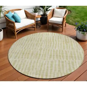 Photo of 8' Beige And Tan Round Striped Washable Indoor Outdoor Area Rug