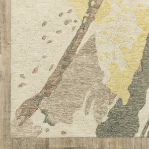 Photo of 8' Beige And Yellow Wool Abstract Hand Tufted Runner Rug