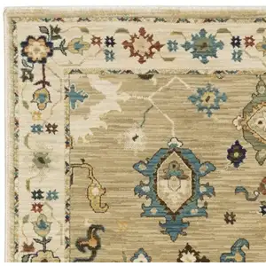 Photo of 8' Beige Blue And Rust Oriental Runner Rug With Fringe