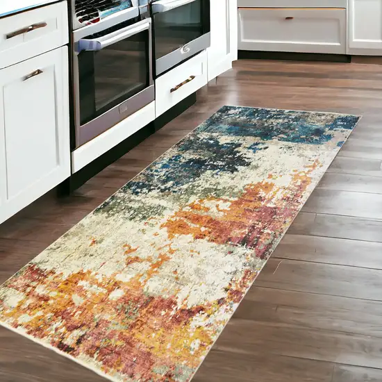 8' Beige Blue and Ivory Abstract Distressed Runner Rug With Fringe Photo 3