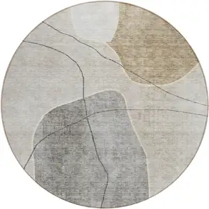 Photo of 8' Beige Brown And Taupe Round Abstract Washable Indoor Outdoor Area Rug