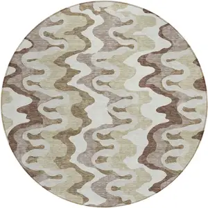 Photo of 8' Beige Brown And Taupe Round Abstract Washable Indoor Outdoor Area Rug