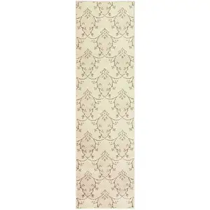 Photo of 8' Beige Green And Brown Floral Vine Stain Resistant Runner Rug