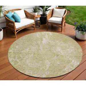 Photo of 8' Beige Ivory And Artichoke Green Round Abstract Washable Indoor Outdoor Area Rug