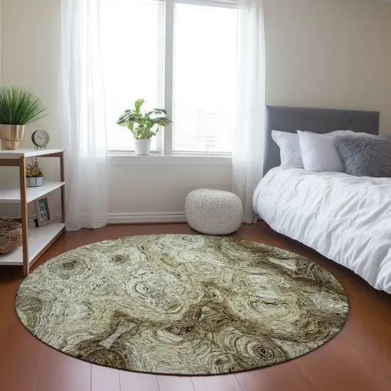 8' Beige Round Abstract Washable Indoor Outdoor Area Rug Photo 7