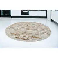 Photo of 7' Beige Round Abstract Washable Non Skid Area Rug With Fringe