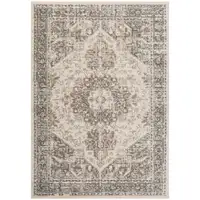 Photo of 8' Beige Round Medallion Power Loom Area Rug