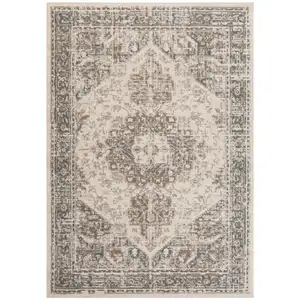 Photo of 8' Beige Round Medallion Power Loom Area Rug