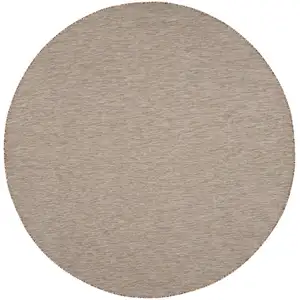 Photo of 8' Beige Round Power Loom Area Rug