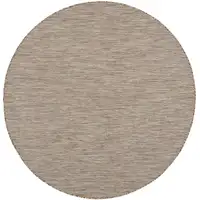 Photo of 6' Beige Round Power Loom Area Rug