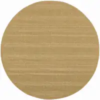 Photo of 8' Beige Round Stain Resistant Indoor Outdoor Area Rug